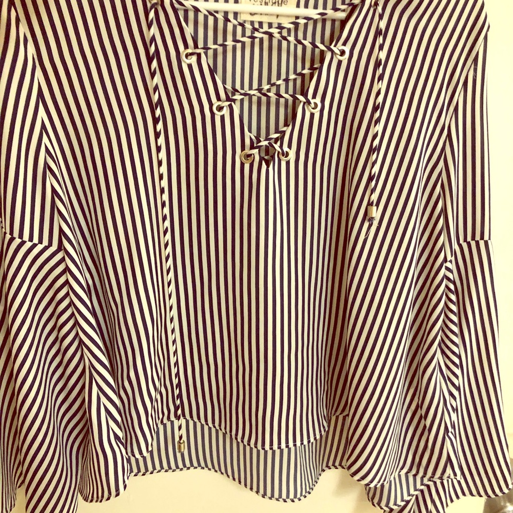 A nice blouse. Light. Ties in the front.